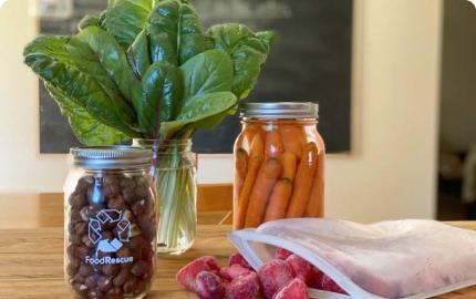 An image shows fresh vegetables on the table.